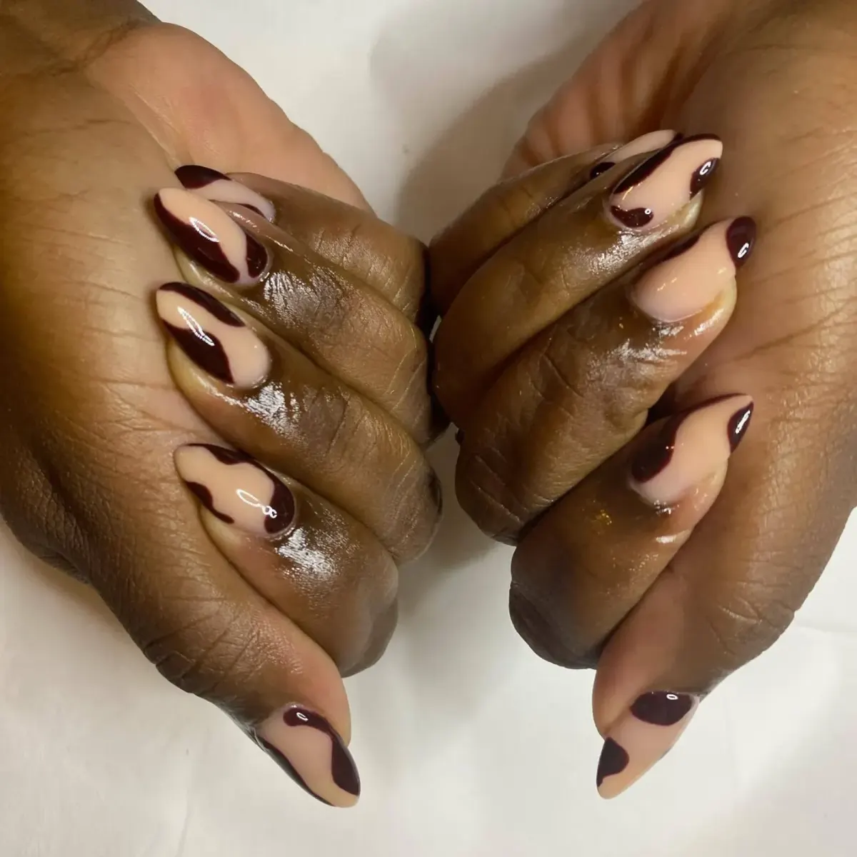 Abstract maroon and nude nail art by Freda O'Reilly, Camden London